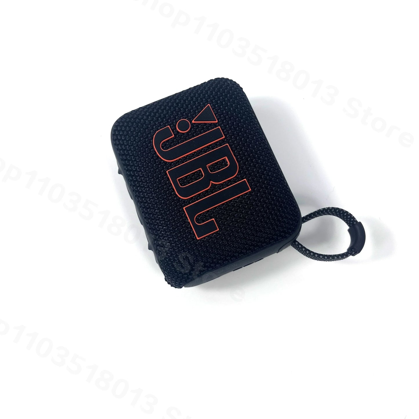 Black JBL GO 4 portable waterproof Bluetooth speaker with textured fabric and carrying strap on white background
