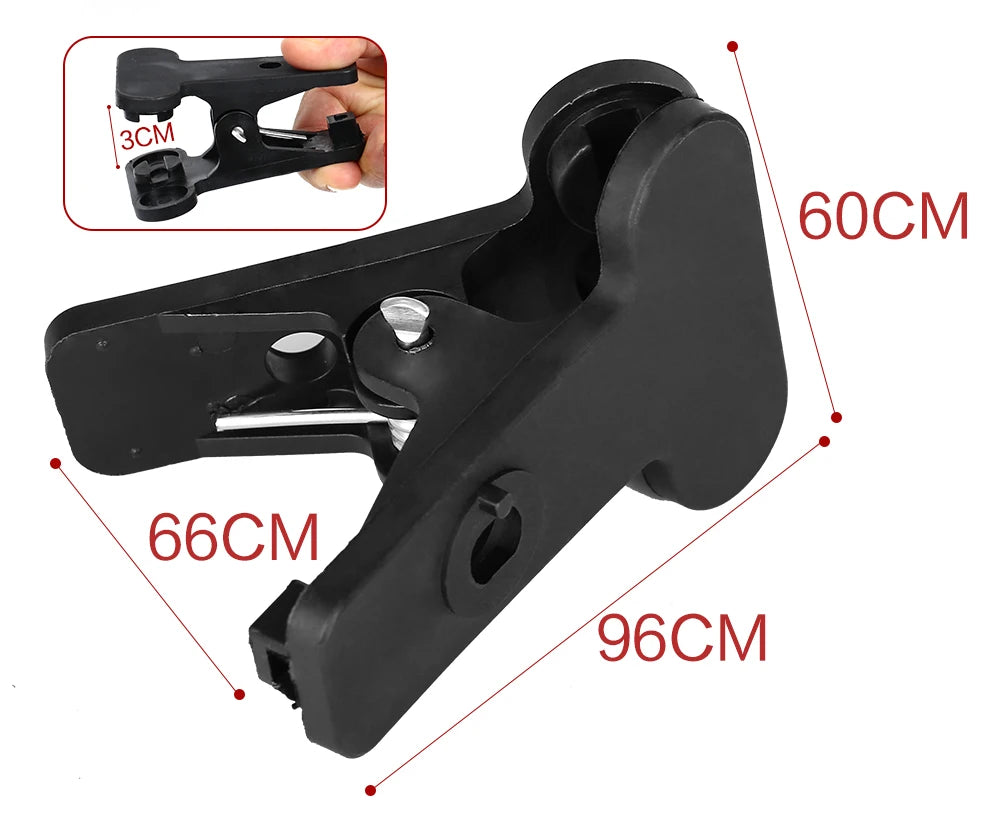 Black plastic clamp with metal lever showing dimensions for photography backdrop support system accessory