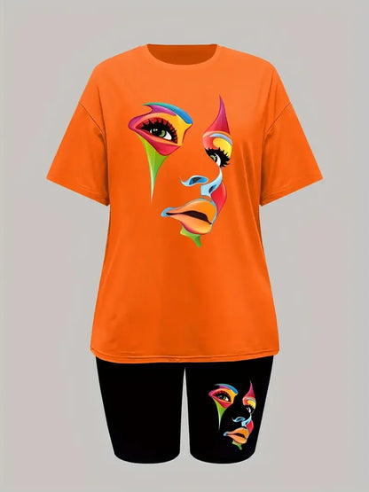 Woman wearing a two-piece chic summer set with orange graphic t-shirt and black fitted shorts featuring colorful face print