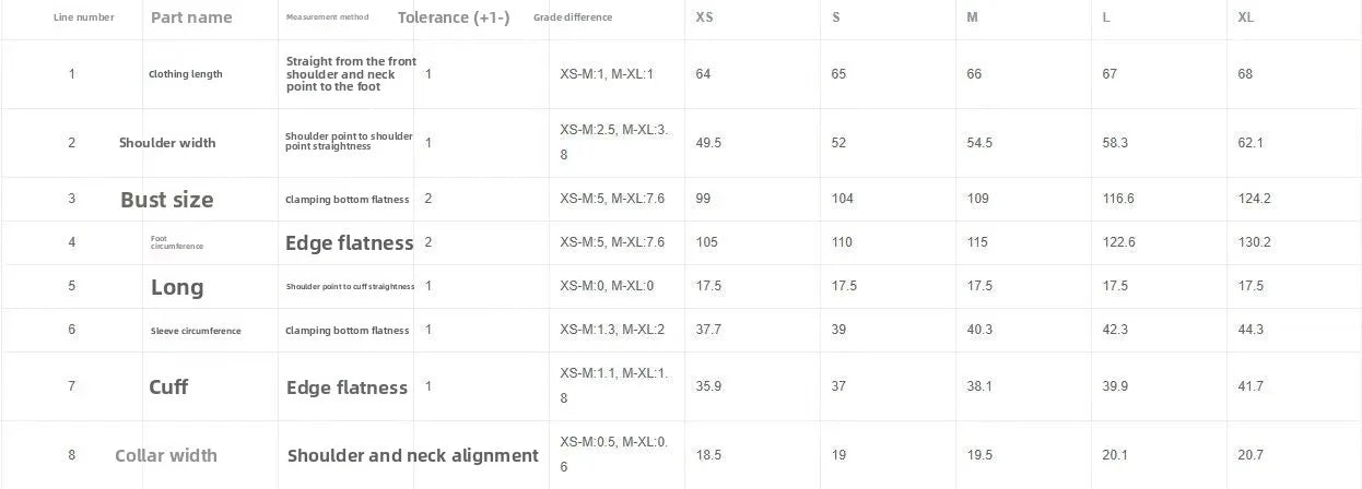 Close-up of size chart table detailing measurements for XS to L in centimeters for a two-piece streetwear outfit