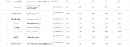 Close-up of size chart table detailing measurements for XS to L in centimeters for a two-piece streetwear outfit