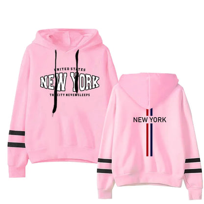Pink two-piece hoodie set with black stripes on sleeves and New York graphic text on front and back