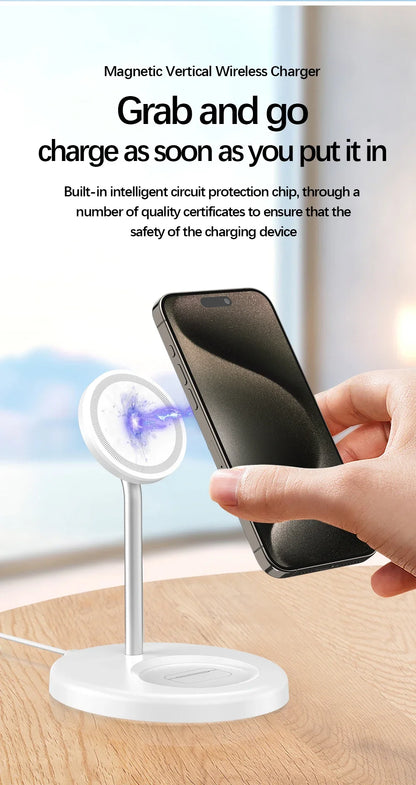 Hand holding a black smartphone above a white magnetic vertical wireless charger on a wooden surface