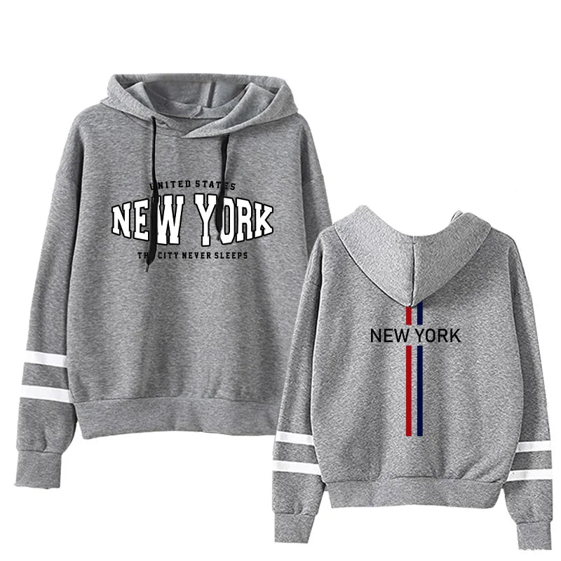 Gray women's hoodie set with New York text, stripes on sleeves, and red and blue vertical back stripes