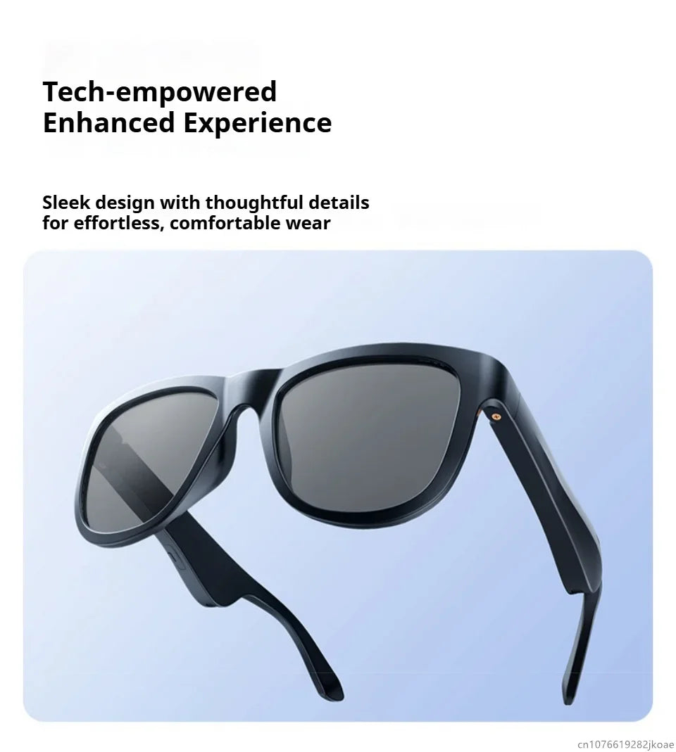Black smart sunglasses with sleek frame and integrated earbuds shown against a light blue background