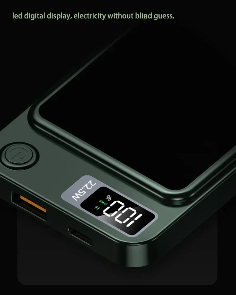 Close-up of black power bank with LED digital display showing battery percentage and power icon