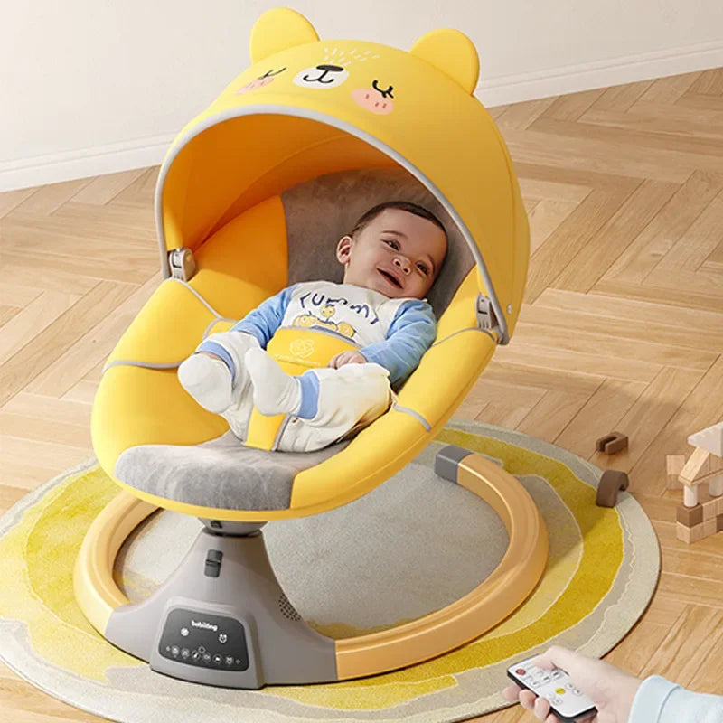 Baby lying comfortably in a yellow electric rocking chair with a bear-shaped canopy on a wooden floor rug
