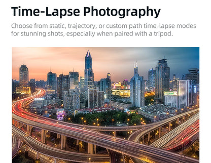 City skyline at dusk with light trails on busy highway overpasses showcasing time-lapse photography effect