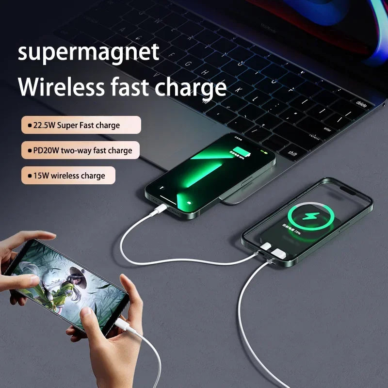 Portable black Xiaomi Mijia 100000mAh magnetic wireless fast charger powering two smartphones via cables and wireless charging
