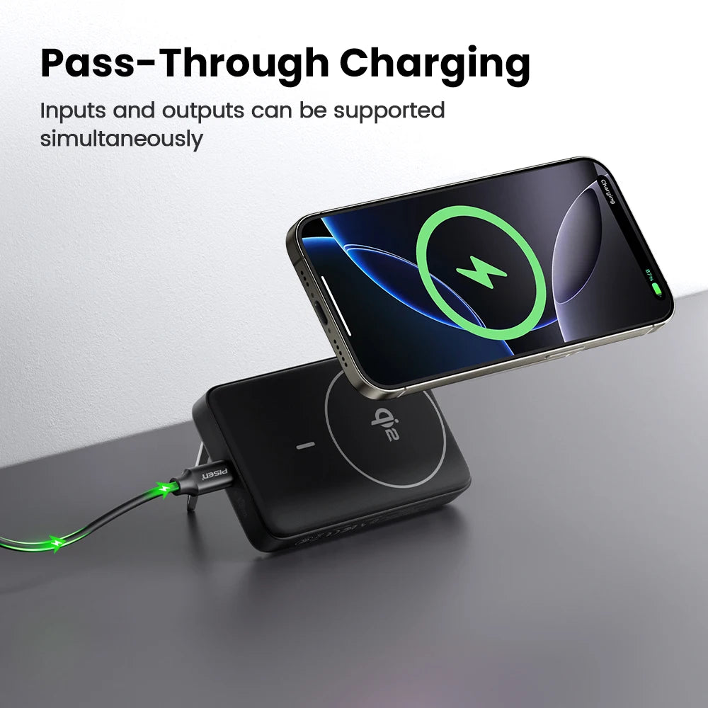 Black PISEN 30W Qi2 magnetic wireless charger and 10000mAh power bank charging an iPhone on a gray surface