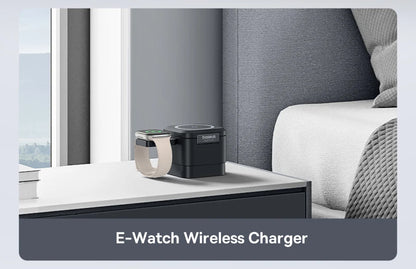 Black Baseus magnetic wireless 3-in-1 charger with Apple Watch placed on a bedside table in a modern bedroom.