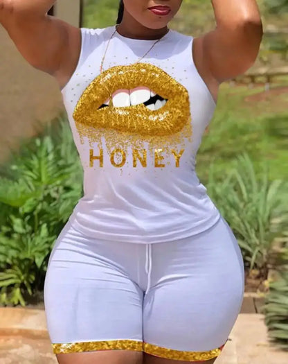 Woman wearing white sleeveless top and shorts with gold lips and honey text design, summer casual outfit