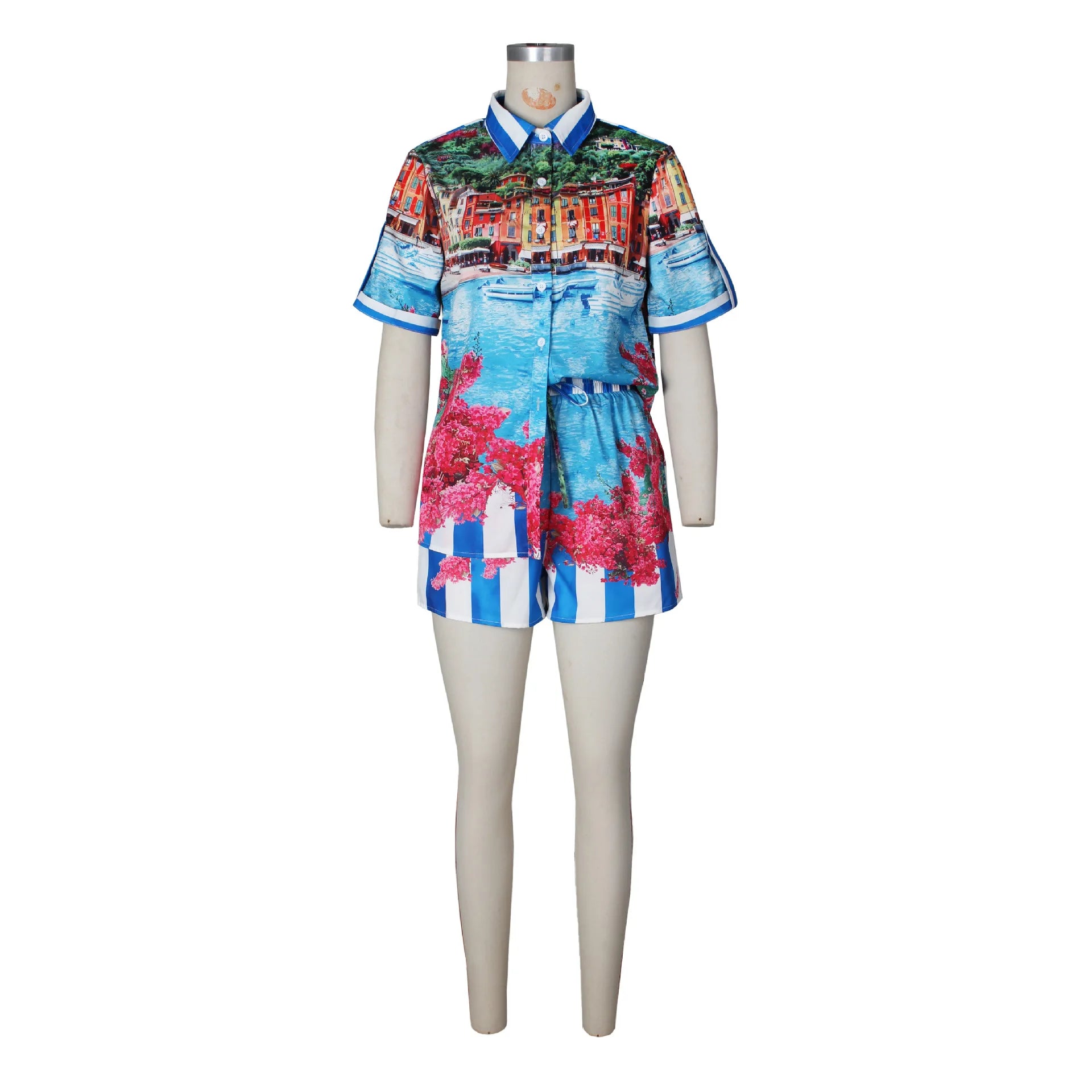 Female mannequin wearing a colorful two-piece vacation set with short-sleeve shirt and matching shorts