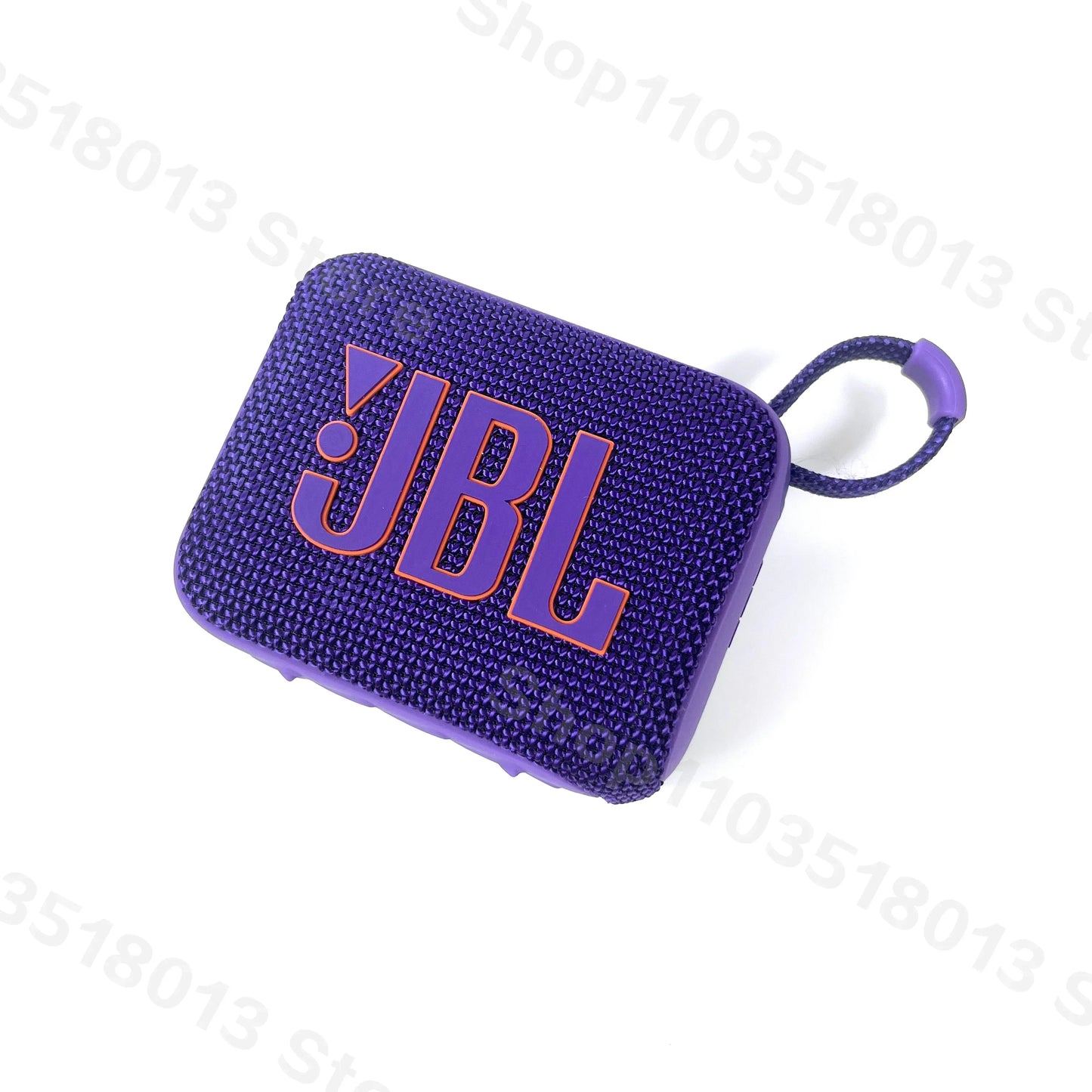 Purple JBL GO 4 portable Bluetooth speaker with fabric texture and attached carrying loop on a white background