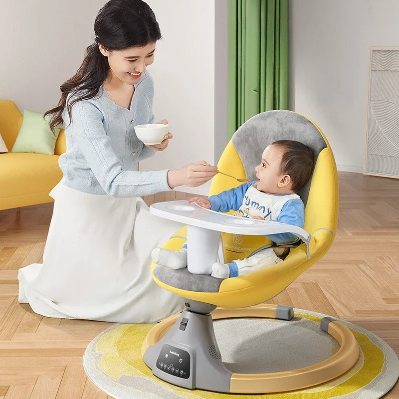 Mother feeding baby sitting in a yellow and gray multifunctional electric rocking chair in a modern room