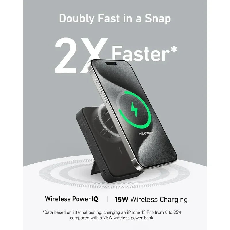 Anker MagGo Power Bank charging phone wirelessly with 15W fast charging and foldable stand on gray background