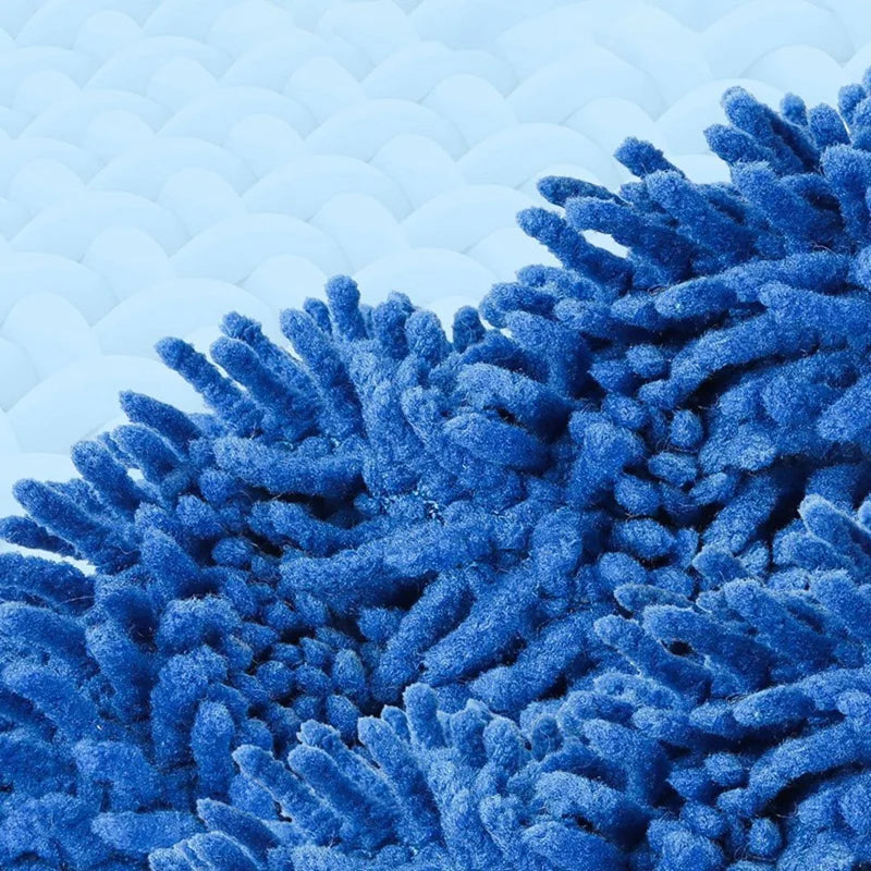 Close-up of blue microfiber cleaning brush fibers on a textured surface for wet and dry robot cleaner accessory