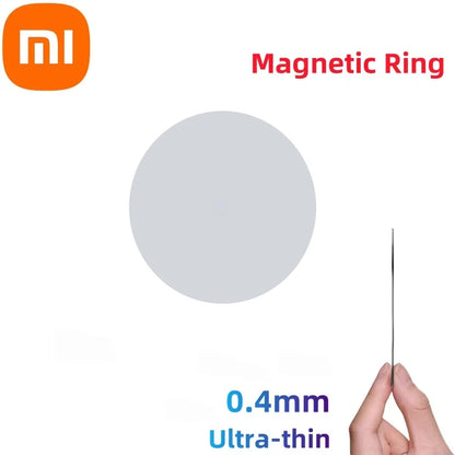 Hand holding an ultra-thin 0.4mm magnetic ring with Xiaomi logo and text Magnetic Ring on white background